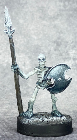 Skeletal Spearman with Blade Steel metals, front view