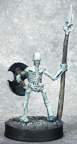 Skeletal Spearman with Blade Steel metals, rear view